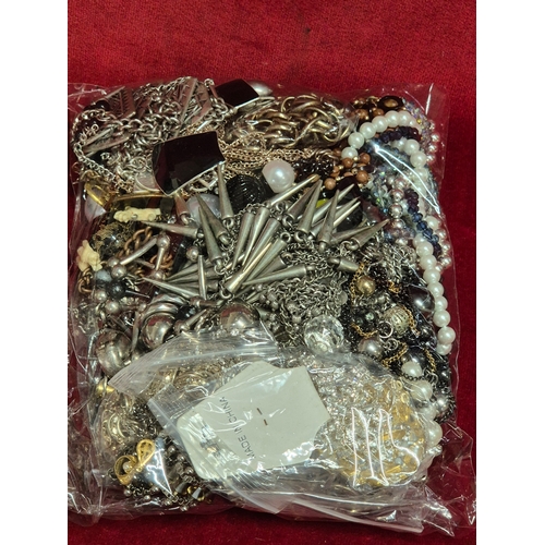 68 - 2 large bags of mixed costume jewellery