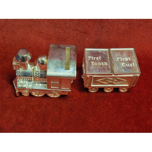 69 - Silver plated train with first tooth and first curl pots plus a Star pot with miniature stars