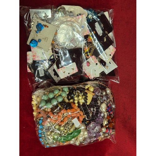 74 - 2 bags of costume jewellery