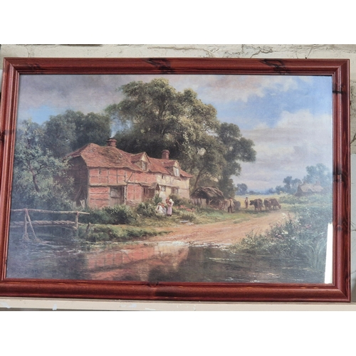 86 - A large framed print of a country scene with figures in a field of poppies by Ernst Wilburn 1872 to ... 