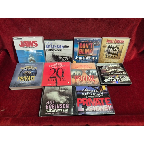 93 - 10 x books on tape CD's, mostly James Patterson