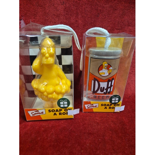 96 - The Simpsons novelty items Talking Keychain and 2 Soap on a Ropes, all new in packets plus a small S... 