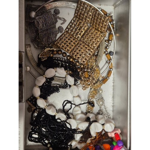 100 - Vintage cash tin with contents of costume jewellery
