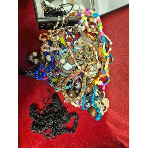 100 - Vintage cash tin with contents of costume jewellery