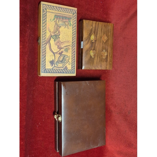 102 - 3 decorative gaming boxes, 2 in wood with contents of playing cards and Backgammon pieces