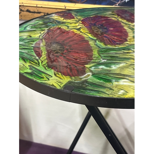 132 - Poppy side table- decorative Poppy designed glass top, metal frame, folding table