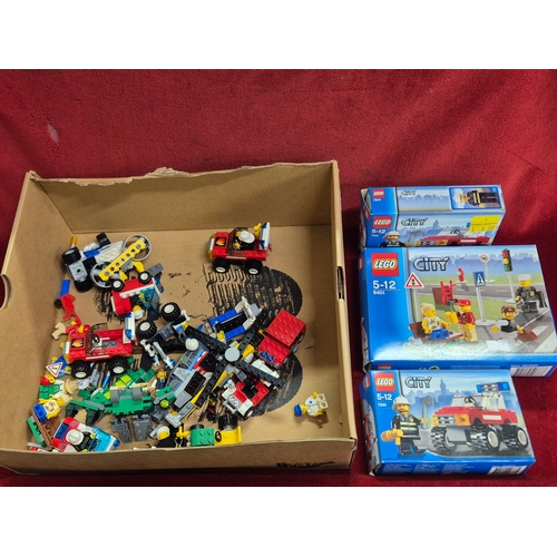 107 - Box of Lego parts to include Lego City sets