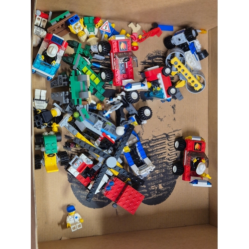 107 - Box of Lego parts to include Lego City sets