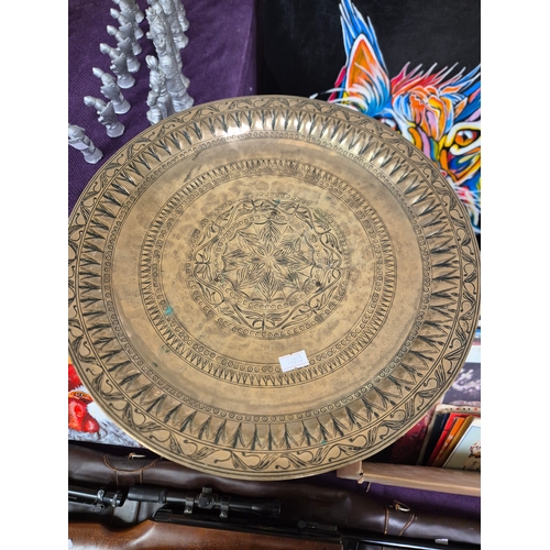 114 - Vintage brass pedestal stand, possibly a church collection tray or a small side table.