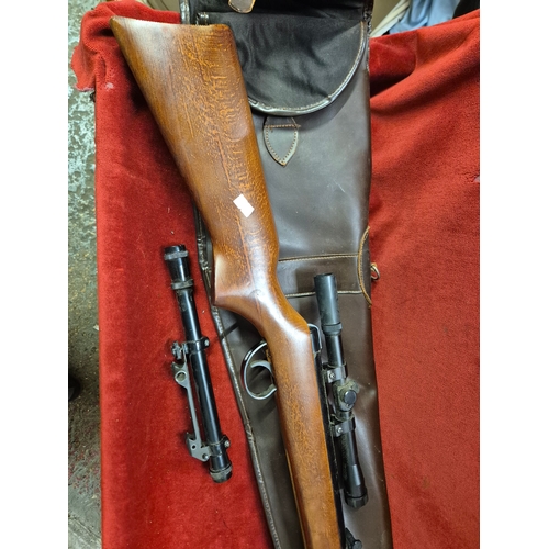 119 - BSA Meteor air rifle with 2 scopes and leather slip bag