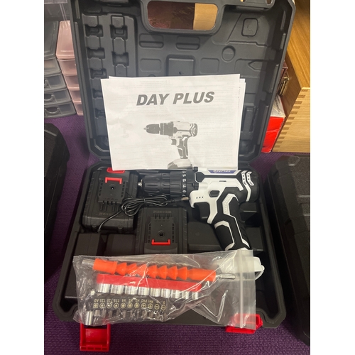 152 - DayPlus cordless hammer drill, new in case
