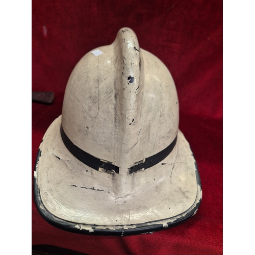 129 - Vintage Fireman's helmet 'Essex County FIRE Brigade' plus a Fireman's Axe with crows foot mark 1953
