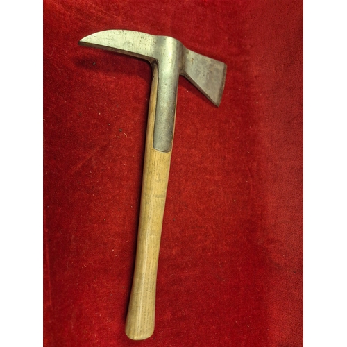 129 - Vintage Fireman's helmet 'Essex County FIRE Brigade' plus a Fireman's Axe with crows foot mark 1953