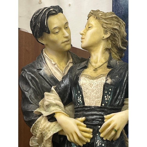 159 - This is a late 20th-century 'Romantic Moments' sculpture, depicting a couple in an embrace.