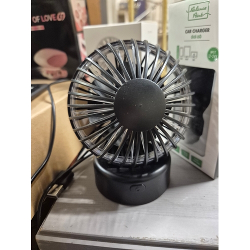 189 - Amazon Kindle, handheld fan, small usb desk fan, car charger and a Heart of Love hair remover