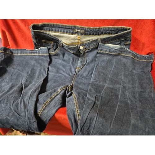 197 - 2 pairs ladies jeans sizes 24 and 28 plus a jumpsuit and a shirt style top both 5XL