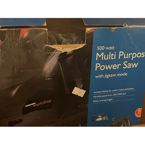 204 - Multi purpose power saw,metal tin with tools and drill