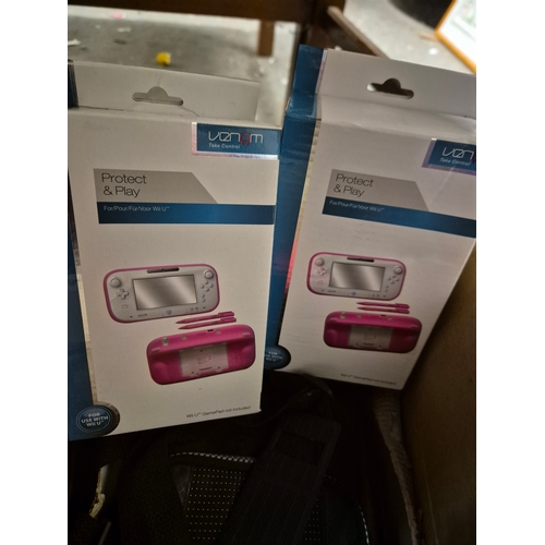 208 - Box of mixed items to include red glass wall clock, binoculars, Wii U cases new in boxes plus more