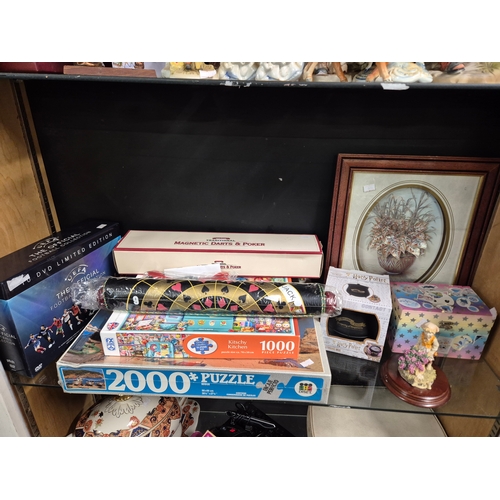 234 - 3 shelves of mixed decorative and household items plus toys and games