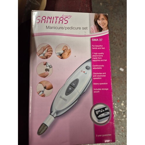 236 - New pampering items - Sanitas manicure/pedicure, Electric heating pad and Memory Foam neck cushion