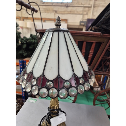 242 - Small traditional white Tiffany-style table lamp with multiple transparent glass jewels and an antiq... 