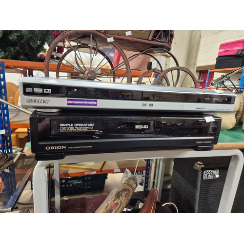 243 - Sony DVD recorder RDR GX120 plus an Orion video cassette recorder