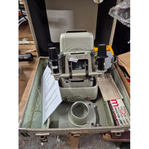 249 - Aldis slide projector and 2 boxes of vintage tape reels