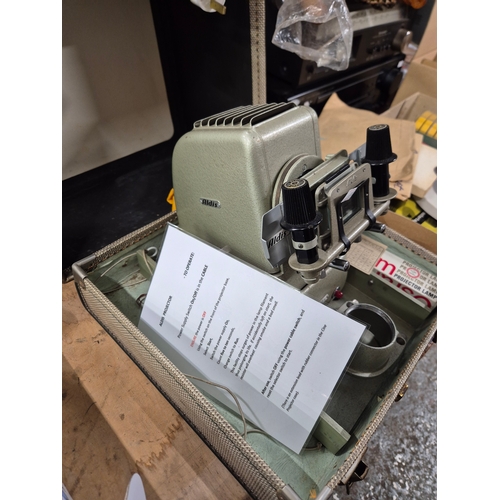 249 - Aldis slide projector and 2 boxes of vintage tape reels