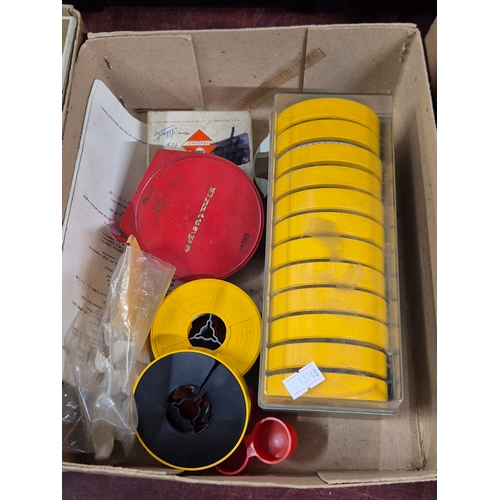 249 - Aldis slide projector and 2 boxes of vintage tape reels