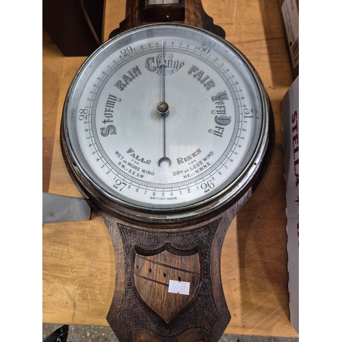 297 - Edwardian oak aneroid barometer and thermometer