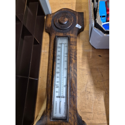 297 - Edwardian oak aneroid barometer and thermometer