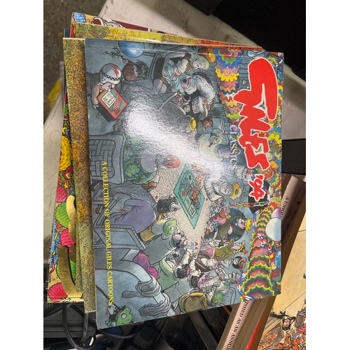 275 - Collection of Giles annuals including the 49th official 1990/2000 exc condition