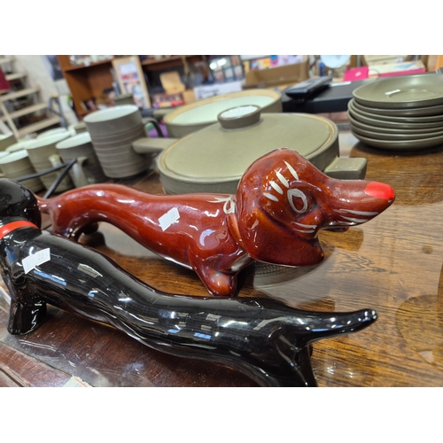 303 - 2 x 1960's hand painted dog ornaments