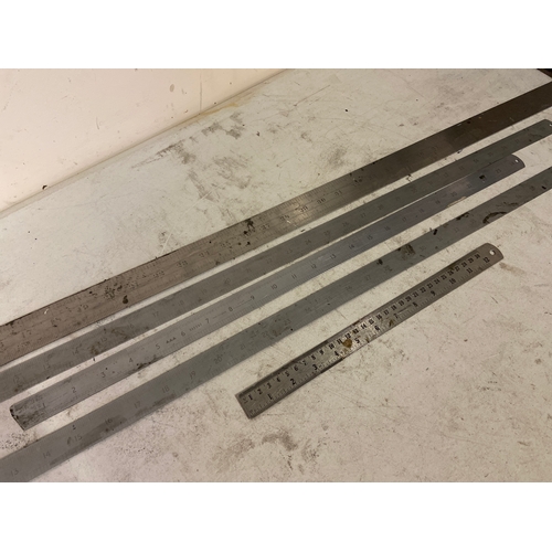 24A - Various steel rules/rulers.