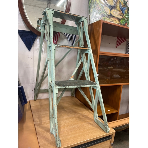 This vintage green wooden step ladder is likely a British-made ...