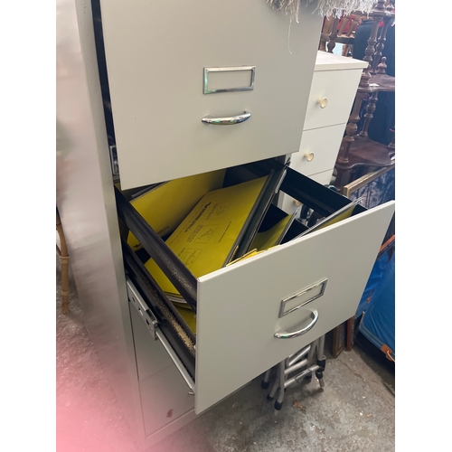 301 - Grey metal 4 drawer filing cabinet  with key