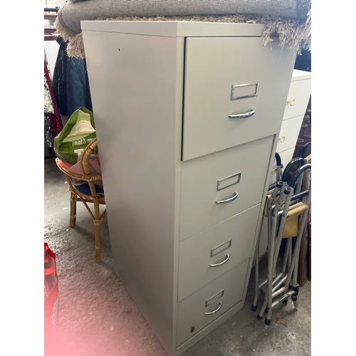 301 - Grey metal 4 drawer filing cabinet  with key