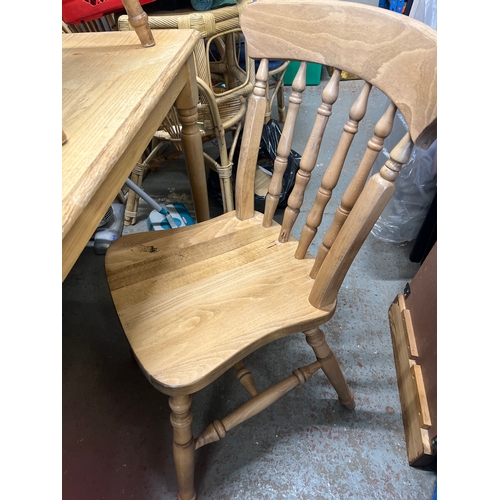 313 - Small pine kitchen table and 3 spindle back chairs