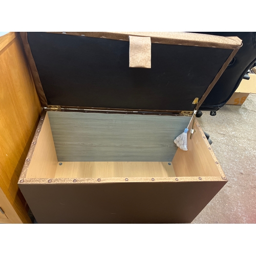 325 - Stylish storage chest upholstered in Bronze fabric
