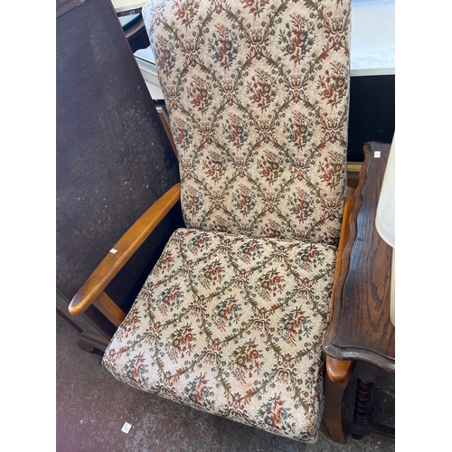 331 - vintage armchair  with floral tapestry upholstery in a traditional style.