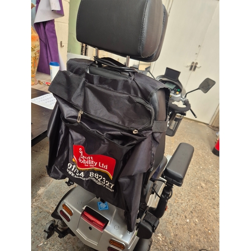 60 - Quingo Vitess mobility scooter, full working order with keys, battery and charger plus rain cover an... 