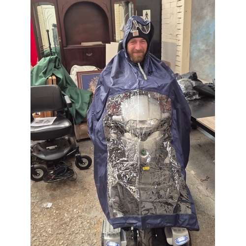 60 - Quingo Vitess mobility scooter, full working order with keys, battery and charger plus rain cover an... 