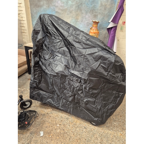 60 - Quingo Vitess mobility scooter, full working order with keys, battery and charger plus rain cover an... 