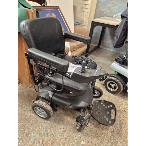 61 - Electric wheelchair with charger, in working order