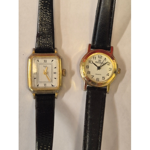 50 - 6 Ladies wristwatches with black leather straps