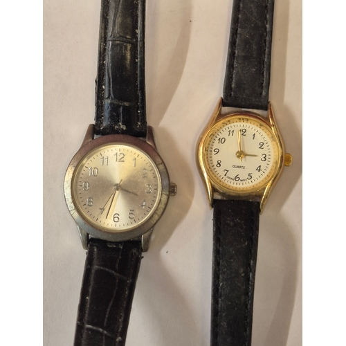 50 - 6 Ladies wristwatches with black leather straps