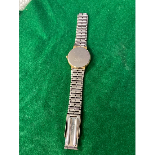 16 - Vintage Accurist quartz day-date wristwatch, with white dial and gold tone stainless steel strap. On... 