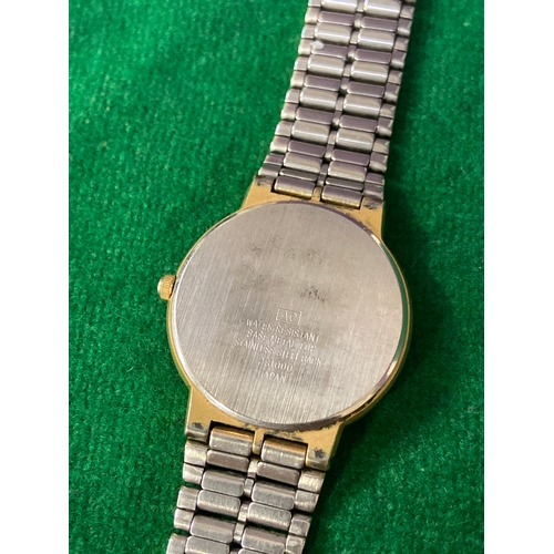 16 - Vintage Accurist quartz day-date wristwatch, with white dial and gold tone stainless steel strap. On... 