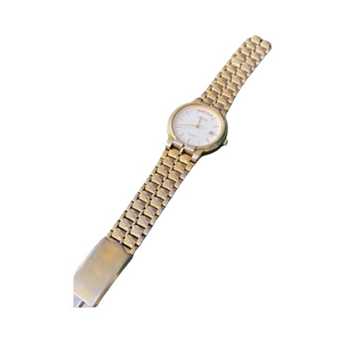 16 - Vintage Accurist quartz day-date wristwatch, with white dial and gold tone stainless steel strap. On... 