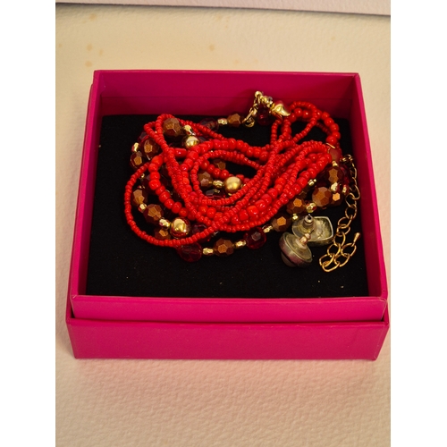 32 - 3 small boxes of costume jewellery